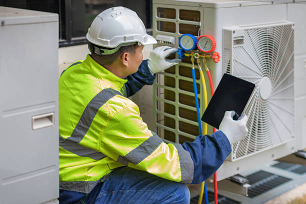 Professional Air Conditioning Repair technician working in Mapleton, ND